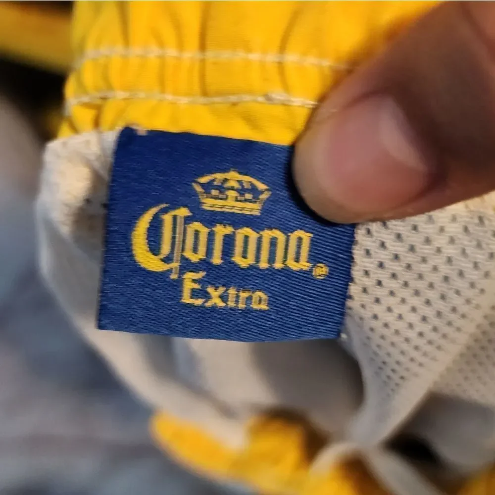 Men's Corona Extra swim trunks, size Large
